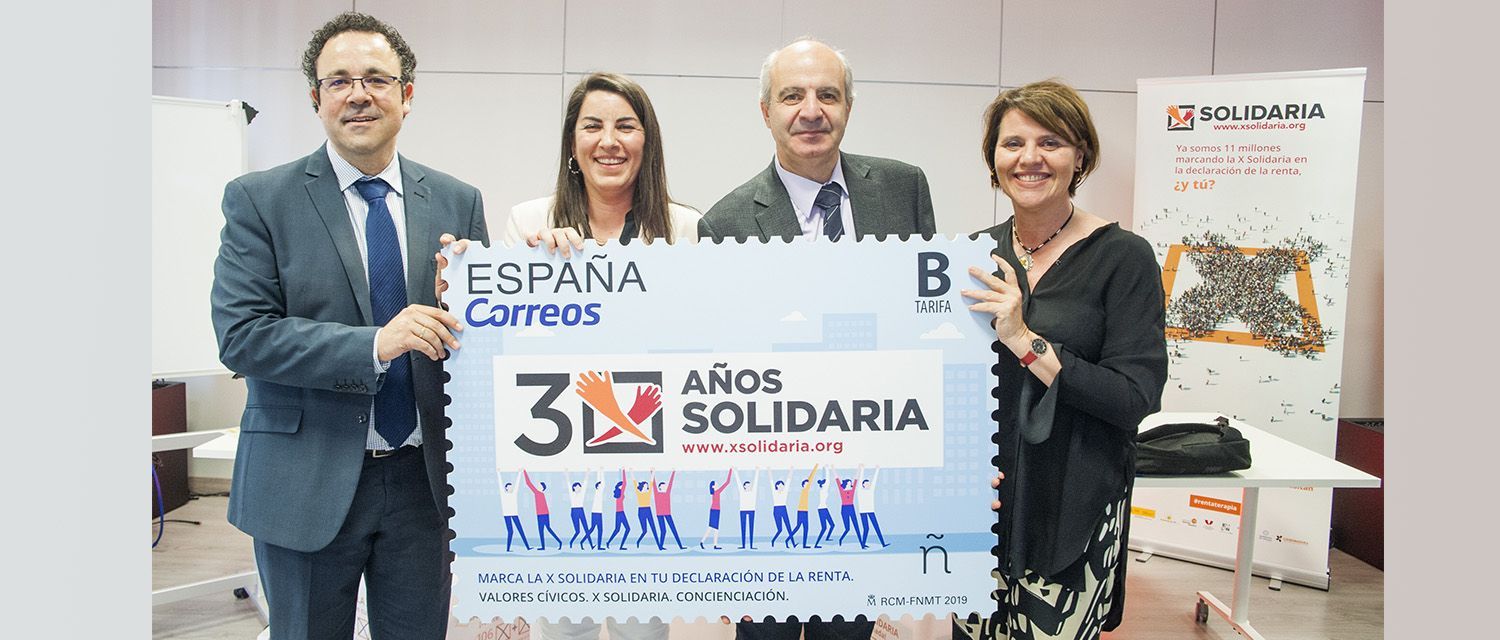 Jesús García, director de la Confederación Autismo España; Asunción Montero, presidenta de la Plataforma de ONG de Acción Social; Modesto Fraguas el director de Filatelia de CORREOS y María Luisa Gómez, directora de la Plataforma de ONG